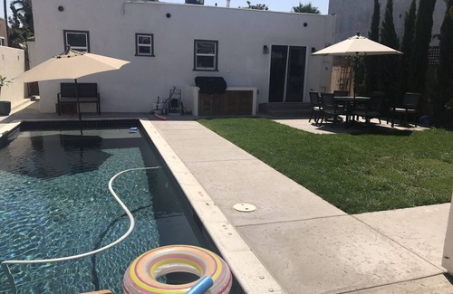 North Park House | Spanish bungalow with pool, built in bbq, and outdoor seating areas.