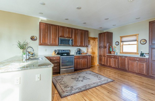 Dayton House | Spectacular lake-view retreat with deck, grill, free WiFi, W/D, & island views