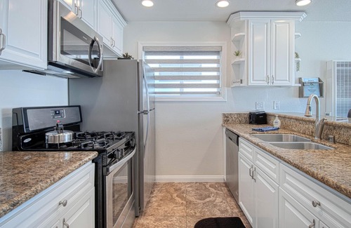Santa Ana Heights Condo | Spectacular oceanfront upper unit with amazing views from awesome roof top deck!