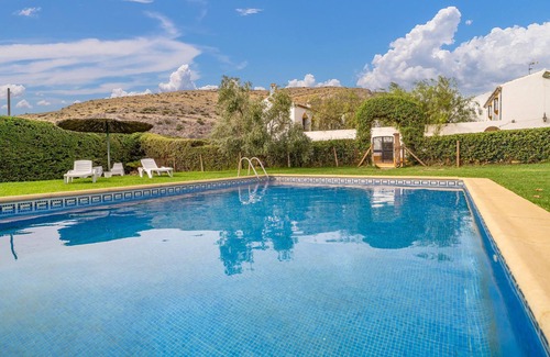 Teba House | Spend a relaxing vacation in this idyllically located vacation home with pool access.