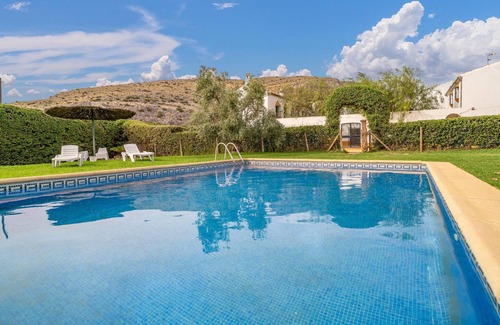 Teba House | Spend a relaxing vacation in this idyllically located vacation home with pool access.