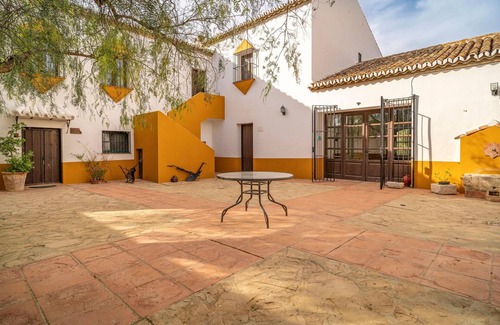 Teba House | Spend a relaxing vacation in this idyllically located vacation home with pool access.