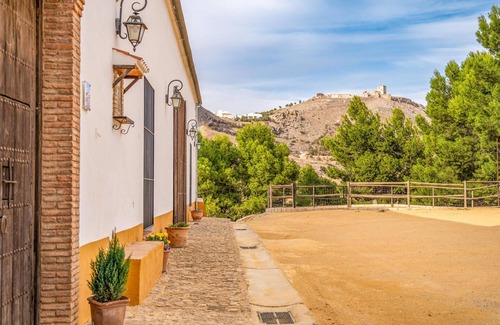 Teba House | Spend a relaxing vacation in this idyllically located vacation home with pool access.