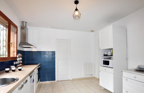 Elne House | Spend an unforgettable vacation in this inviting and modern vacation home.