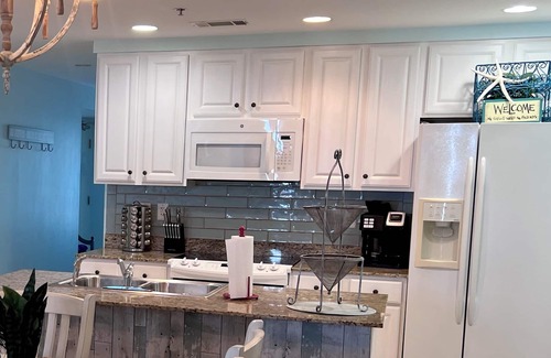West Panama City Beach Condo | Splash Resort Penthouse with Free Beach Chairs and Amazing Top Floor Views