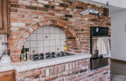Newhall House | Sprawling 4-Bedroom Tudor Retreat with Spacious Backyard Oasis