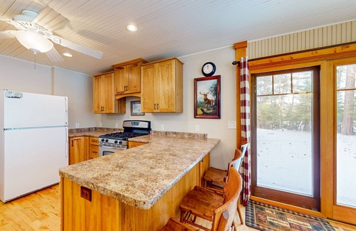 St Germain House | Sprawling lakeside home with dock, kayaks, pool table, fireplace, grill, & AC
