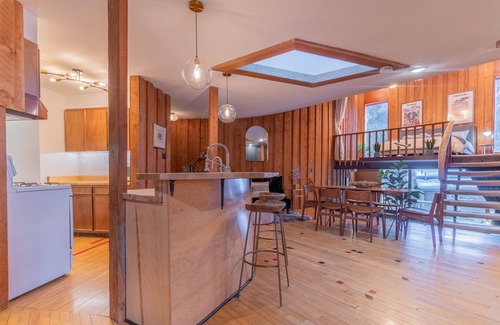 College House | Star-Shaped Midcentury Modern Aurora Retreat + Hot Tub + Game Room