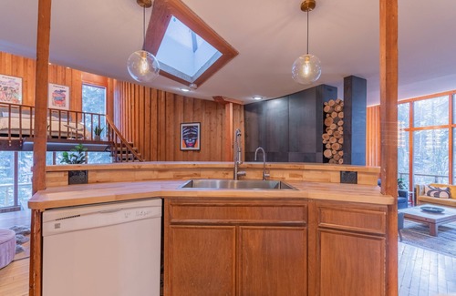 College House | Star-Shaped Midcentury Modern Aurora Retreat + Hot Tub + Game Room