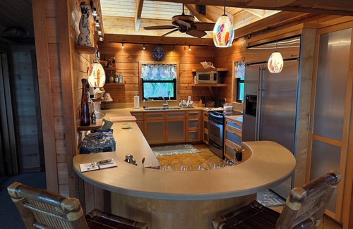 Venetian Shores House | Stay at the Pirate House conveniently located on Snake Creek in Venetian Shores