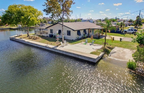 Sea Ranch House | "Stay Salty" Florida Pool/Canal Home, 4 bed, 3.5 bath, bring boat!