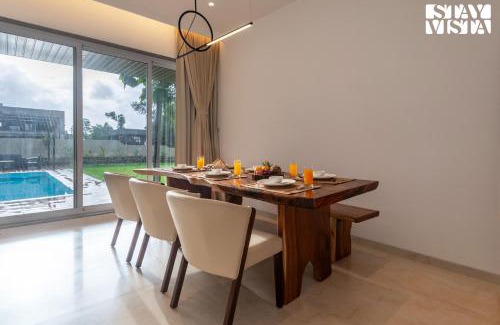 Karjat Villa | StayVista at Gulposh Retreat with Pool, Lawn & Gazebo