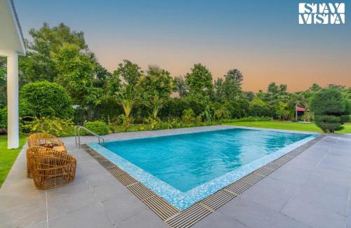 Gurugram Villa | StayVista at Imperial Isle 4BHK with FREE BF Luxury Pool Villa in Sohna Delhi