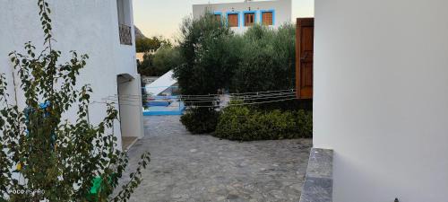 Panormos Apartment | Stefanos Gerakios Apartments by climbing house