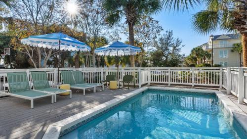 Crystal Shores House | Steps to Beach Arcade Game Room Pool Hot Tub Calico Scallop by AvantStay