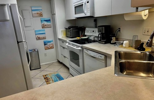 Longboat Key Condo | Steps to private beach and Gulf Coast Florida sunsets!