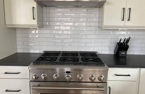 Beach Haven House | Steps to the beach, beautiful views, gourmet kitchen, sleeps 14, pool, elevator.