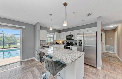 Oakland Hills House | Stocked Pool Home Canal View 8 Miles Beaches, Golfing, Fishing, Entertainment!nn