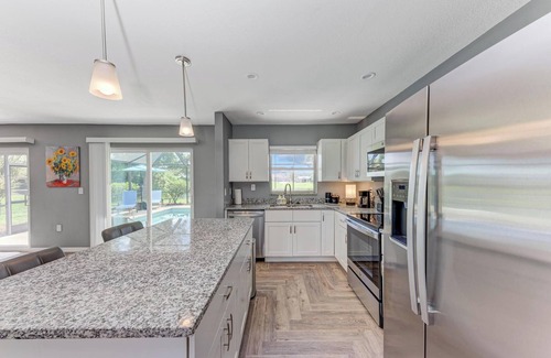 Oakland Hills House | Stocked Pool Home Canal View 8 Miles Beaches, Golfing, Fishing, Entertainment!nn