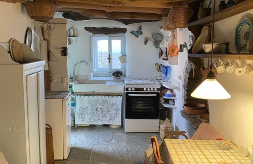Andros Cottage | Stone-built cottage with glorious views on its own hillside