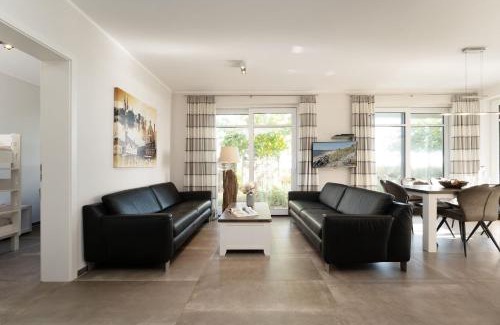 Fehmarnsund Apartment | Strandresidenz Vogelflug App 8