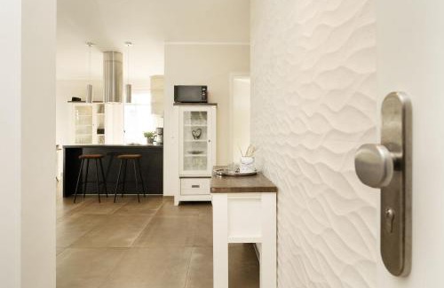 Fehmarnsund Apartment | Strandresidenz Vogelflug App 8