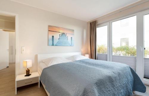 Fehmarnsund Apartment | Strandresidenz Vogelflug App16