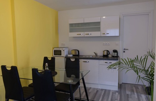 Bukfurdo Apartment | Studio and family apartments with a patio each. Continental breakfast served.