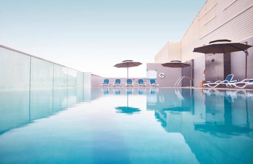 Dubai Sports City Hotel | Studio Apartment In Sports City By E R