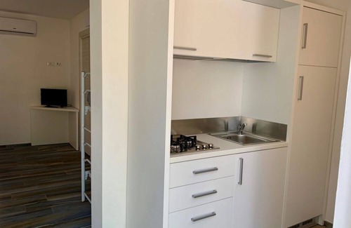 Chiesiola Apartment | Studio 'Baia Falcone-Villetta Mare 110' with sea view, Wi-Fi and air conditioning