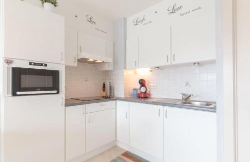 De Haan Apartment | Studio Bowie with shared pool by Interhome