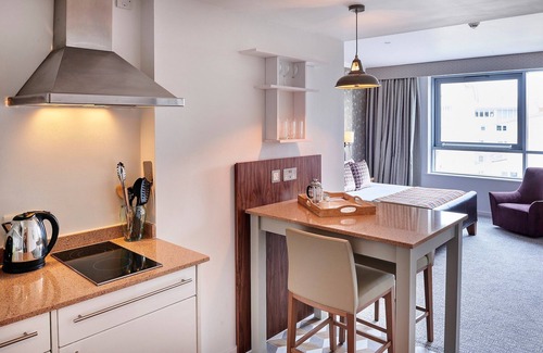 The Docks Apartment | Studio Suite with Free Wi-Fi | Complimentary Breakfast + Fitness Centre On-Site