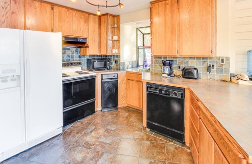 Harrison House | Stunning Bay Front Home with Lake Views, Private Dock, Gas Grill, and Free WiFi