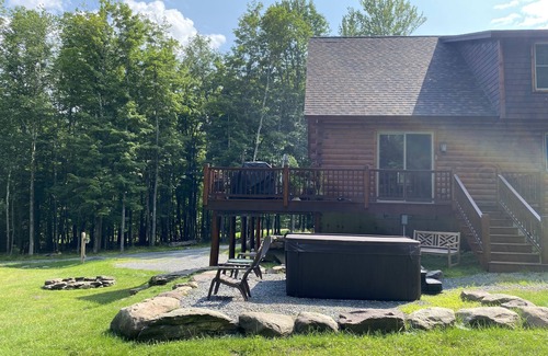 Windham House | Stunning Chalet style home with 8 Person Hot Tub, Fire pit & Sauna & steam rm.