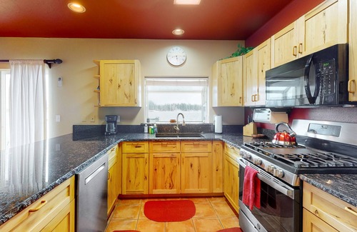 Pagosa Springs House | Stunning lake house with dock, firepit, grill, canoes, & mountain views
