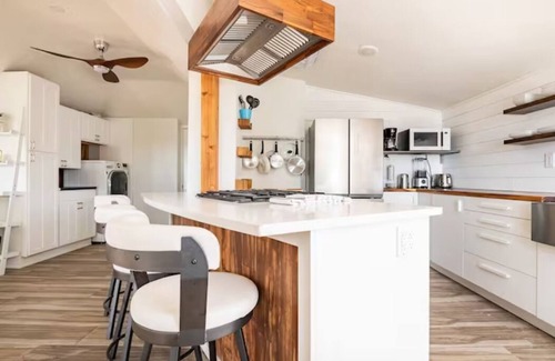 Central Colorado Springs House | Stunning Lakefront Home ~Centrally Located~Views~Hot Tub~4 Paddleboards~Pets Ok