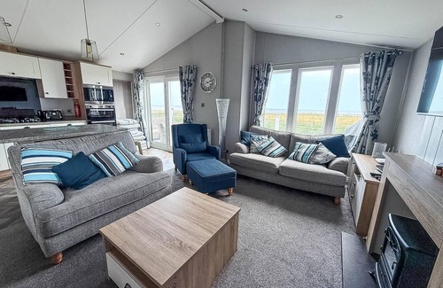 Hopton Cabin | Stunning lodge with full sea views and decking at Broadland Sands ref 20076CF
