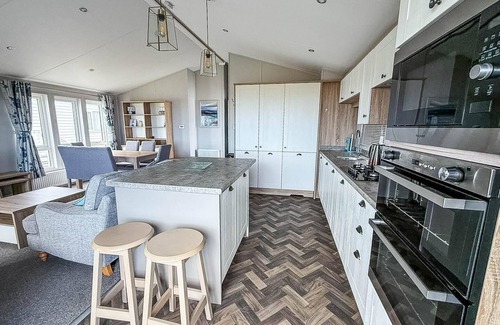 Hopton Cabin | Stunning lodge with full sea views and decking at Broadland Sands ref 20076CF