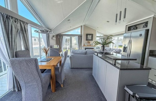 Hunstanton House | Stunning lodge with decking at Manor Park near Hunstanton Beach ref 23066W