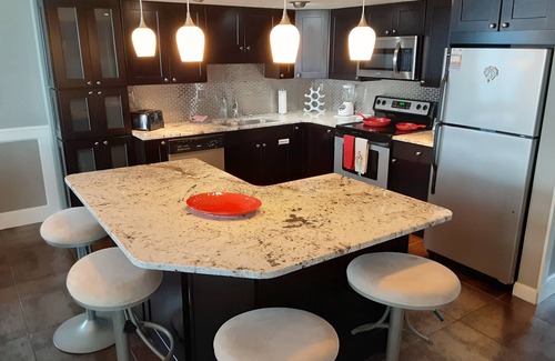 Biltmore Beach Condo | STUNNING SUNSETS 2BR Luxury Ocean Front Condo with Free seasonal beach service n
