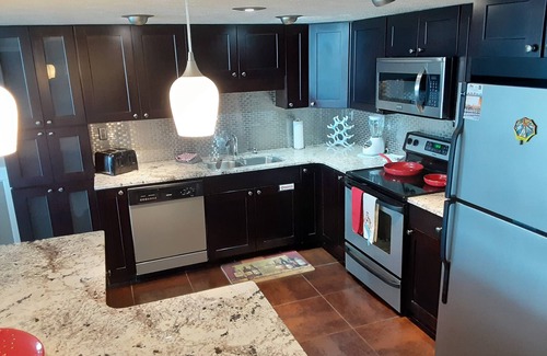 Biltmore Beach Condo | STUNNING SUNSETS 2BR Luxury Ocean Front Condo with Free seasonal beach service n