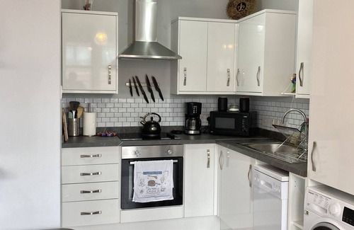 Belfast Central District Condo | Stylish 2-bed, 2-bath condo with private balcony