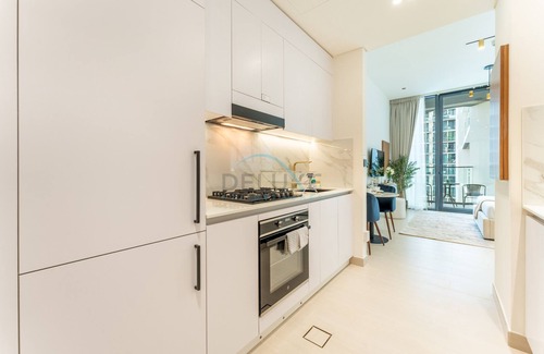 Jumeirah Village Circle Apartment | Stylish Stay Near Dubai Autodrome & Trump Golf Club, Binghatti Amber, by Deluxe Holiday Homes
