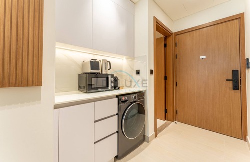 Jumeirah Village Circle Apartment | Stylish Stay Near Dubai Autodrome & Trump Golf Club, Binghatti Amber, by Deluxe Holiday Homes