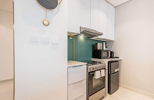 Dubai Apartment | Stylish Studio Apartment in Blue Wave Tower, Dubailand by Deluxe Holiday Homes