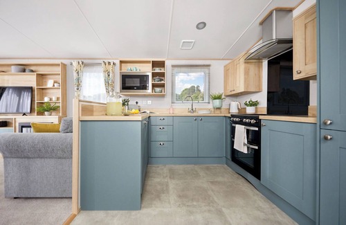 Truro House | Stylish with a touch of luxury 12ft-wide caravan with one double and two twins.