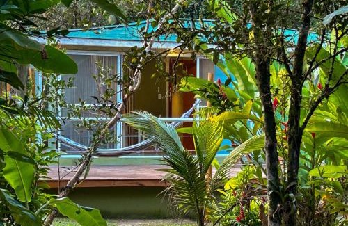 Corcovado Cabin | Suíte Tiê com vista para o lago