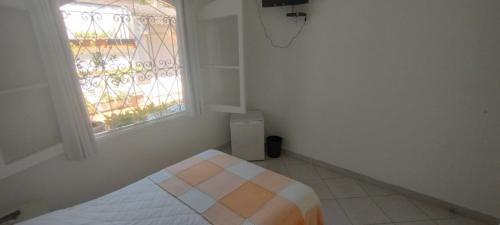 Enseada House | Suítes Casa Branca