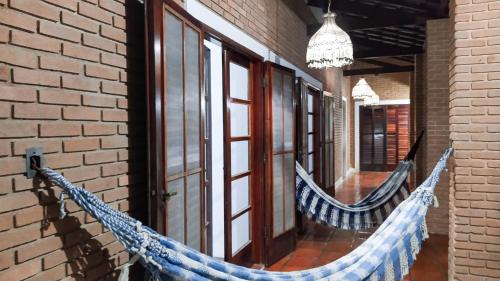 Barra da Lagoa House | SUÍTES NA PRAIA DO ITAGUÁ conchegouba