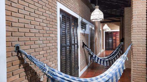 Barra da Lagoa House | SUÍTES NA PRAIA DO ITAGUÁ conchegouba